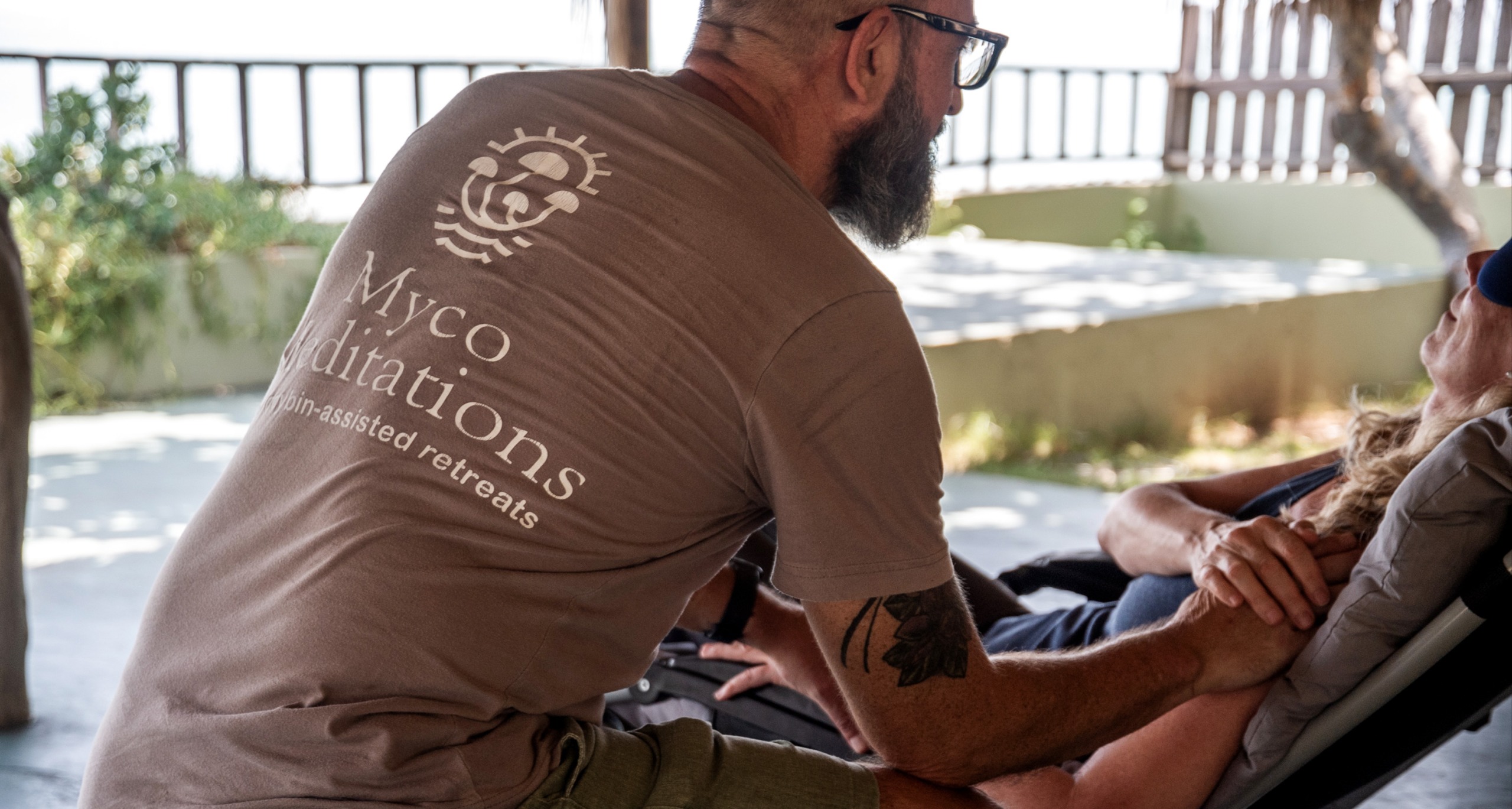 Justin Townsend, CEO and head facilitator, guides a client during a therapy session.